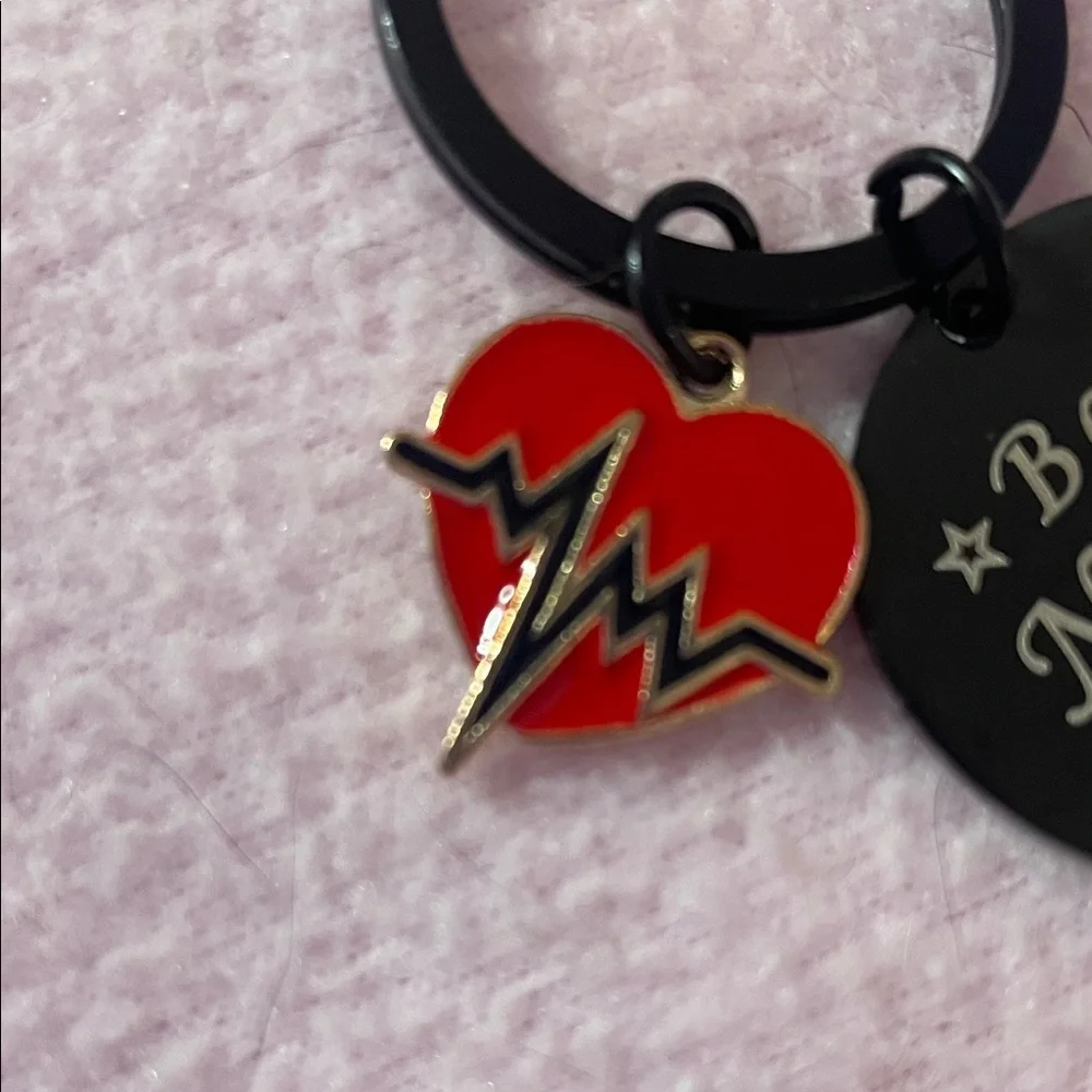Source Unknown keychain red